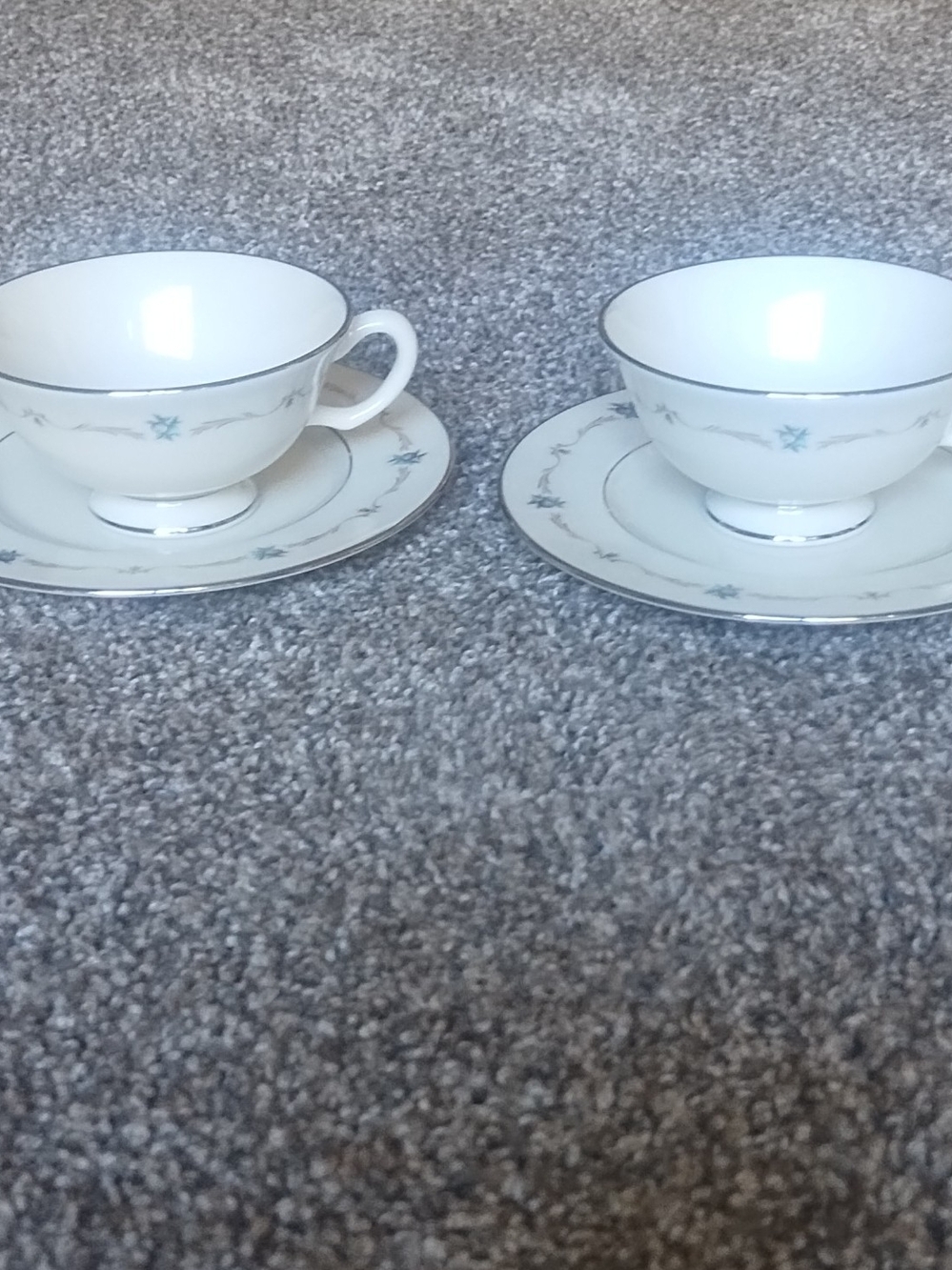 Lenox White Porcelain Teacups and Saucers with Silver Trim and Light Blue Motif